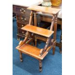 A reproduction set of mahogany library steps.