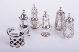 Two silver pairs of pepper pots, another and a lidded mustard pot in silver, total weight