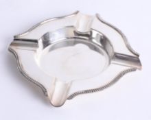 A silver ashtray with ribbed decoration, Birmingham maker J.B.C. and S, total weight 3.75oz,