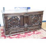 An 18th century oak coffer with geometric mouldings and scratch carved date of 1753 (faults) width