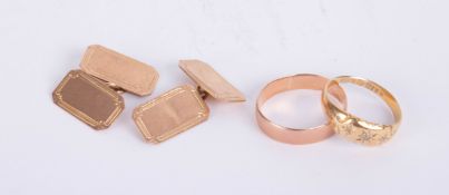 A pair of 9ct gold cufflinks (3.9g), a gold wedding band indistinct mark and 18ct gold ring (2g).