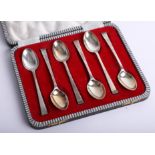 A cased set of silver coffee spoons with graduated stem and ribbed decoration, Sheffield maker 'C.