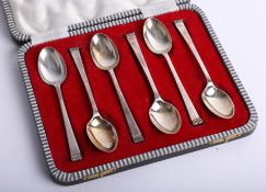 A cased set of silver coffee spoons with graduated stem and ribbed decoration, Sheffield maker 'C.