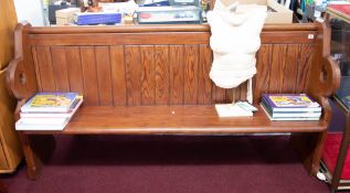 WITHDRAWN- A pitched pine church pew, length 182cm.