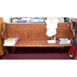 WITHDRAWN- A pitched pine church pew, length 182cm.