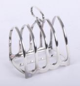 A silver four-piece toast rack, London, maker H.A., weight approximately 3.75oz, 3.50 H (inc