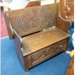 An oak Monks bench.