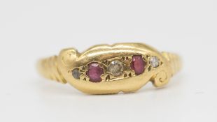 An 18ct small ruby and diamond set antique ring.