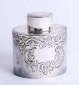 A silver oval tea caddy with lift off top, embossed scroll decorated body, Sheffield maker H.A.,