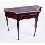 An early 20th Century rosewood writing desk fitted with swing drawers.