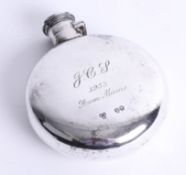 A Victorian silver hip flask with hinged top, plain bulbous body with engraving, London maker E.C.