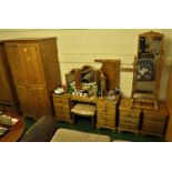 HONEY PINE BEDROOM SUITE COMPRISING TWO DOOR WARDROBE, NINE DRAWER DRESSING TABLE, DRESSING TABLE