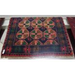 RED AND BLUE GROUND HAND KNOTTED PATTERNED FLOOR RUG, 124CM X 80CM