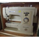 FRISTER AND ROSSMAN MODEL 504 ELECTRIC SEWING MACHINE IN CARRY CASE