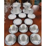 QUANTITY OF NORITAKE 'BLUE HILL' DINNER AND TEA WARE INCLUDING LIDDED TUREENS, TEAPOT, AND CUPS