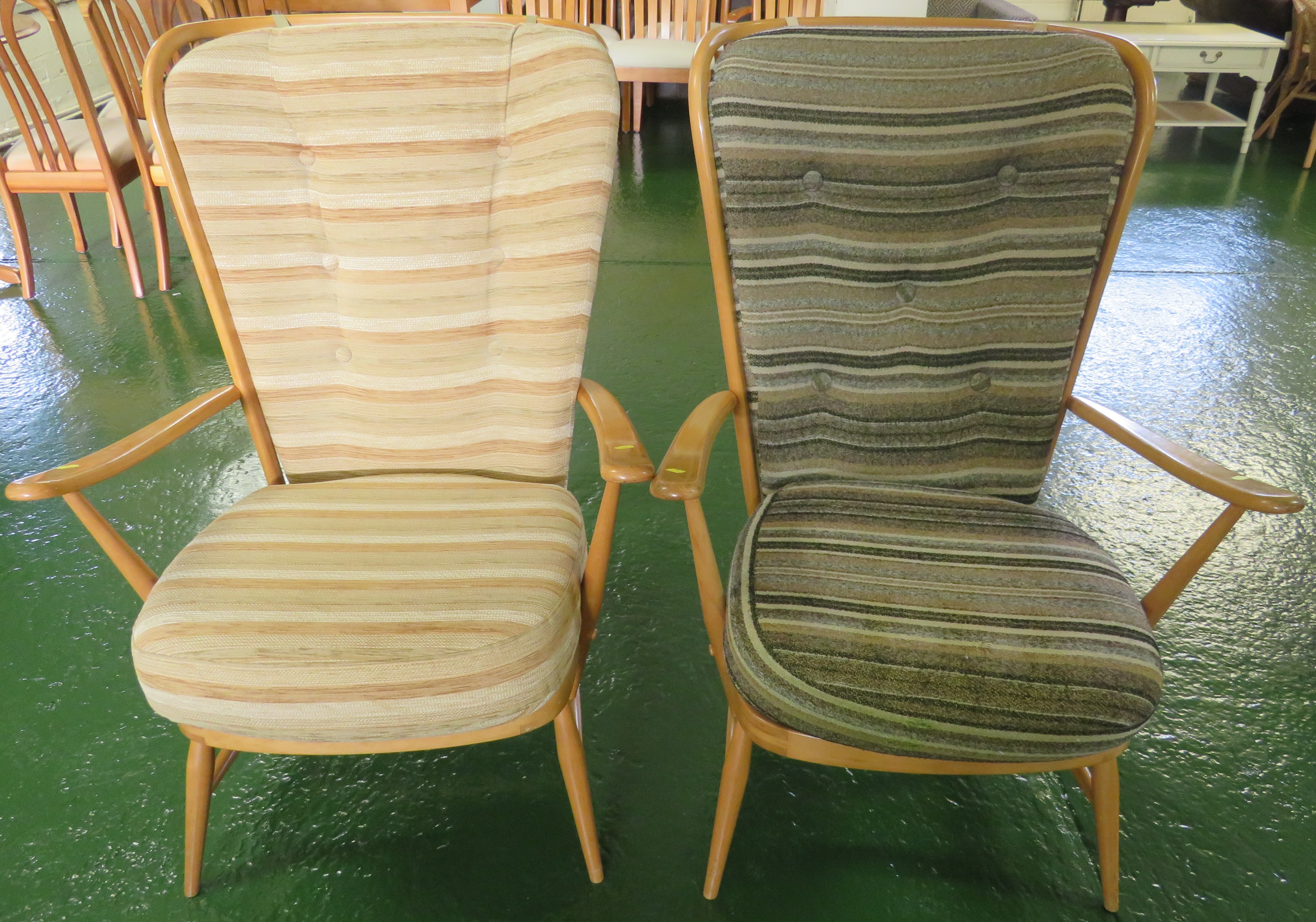 MATCHED PAIR OF ERCOL LIGHT ELM ARMCHAIRS WITH TIE ON STRIPED UPHOLSTERED CUSHIONS
