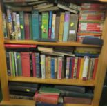 THREE SHELVES OF BOOKS INCLUDING ENID BLYTON TITLES