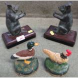 PAIR OF BOOKENDS MODELLED WITH BRONZE PIGS, AND TWO CAST METAL DOORSTOPS - DUCK AND CHICKEN