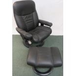 EKORNES STRESSLESS SWIVEL RECLINING ARMCHAIR AND FOOTSTOOL IN BLACK LEATHER UPHOLSTERY
