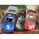 BOX OF RADIO CONTROLLED CAR COMPONENTS AND TWO CONTROLLERS (A/F)