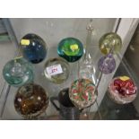 EIGHT GLASS PAPERWEIGHTS, BUBBLE GLASS CANDLE HOLDER AND GLASS SCENT BOTTLE WITH ETCHED DECORATION