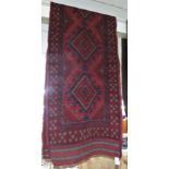 RED GROUND PATTERNED FLOOR RUNNER WITH FIVE MEDALLIONS (261CM X 61CM)