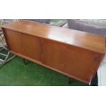 DYRLUND OF DENMARK TEAK SIDEBOARD WITH TWO SLIDING DOORS, STANDING ON TAPERING LEGS