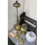TWO OIL LAMPS, OPAQUE GLASS SHADE, SMALL QUANTITY OF ACCESSORIES AND PAIR OF BRASS CANDLESTICKS