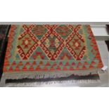 GEOMETRIC PATTERNED HAND KNOTTED FLOOR RUG (123CM X 84CM)