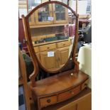 MAHOGANY AND YEW VENEERED SHIELD SHAPED DRESSING TABLE SWING MIRROR ON BOW FRONTED BASE WITH THREE