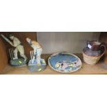 STONEWARE HUNTING JUG, STUDIO POTTERY PLATE AND TWO CRICKET THEMED CAST METAL DOORSTOPS
