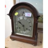 STRIKING MANTLE CLOCK IN DOMED MAHOGANY CASE