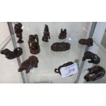 ELEVEN REPRODUCTION OKIMONO AND NETSUKE OF FIGURES AND ANIMALS (WOOD AND RESIN)