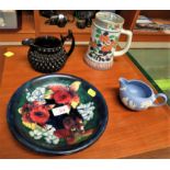 WEDGWOOD JASPERWARE MILK JUG, MOORCROFT POTTERY PLATE, BLACK GLAZED POTTERY JUG AND CHINA TANKARD