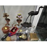 SHELF OF VINTAGE DECORATIVE ITEMS INCLUDING BRASS COBRA CANDLESTICKS, ODDFELLOWS METAL, POWDER