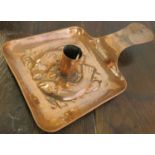 Newlyn copper taper stick, the square tray embossed with two fish, length 26cm, width 14cm