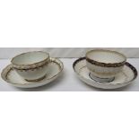 Two Derby blue and gilt wrythen tea bowls and saucers, both with circa 1790 puce marks, pattern