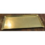 Arts and Crafts planished brass oblong tray, 58cm x 28cm excluding handles