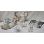 Nao animal figures - three small polar bears, standing cat, cat with wool (1978), and cat with