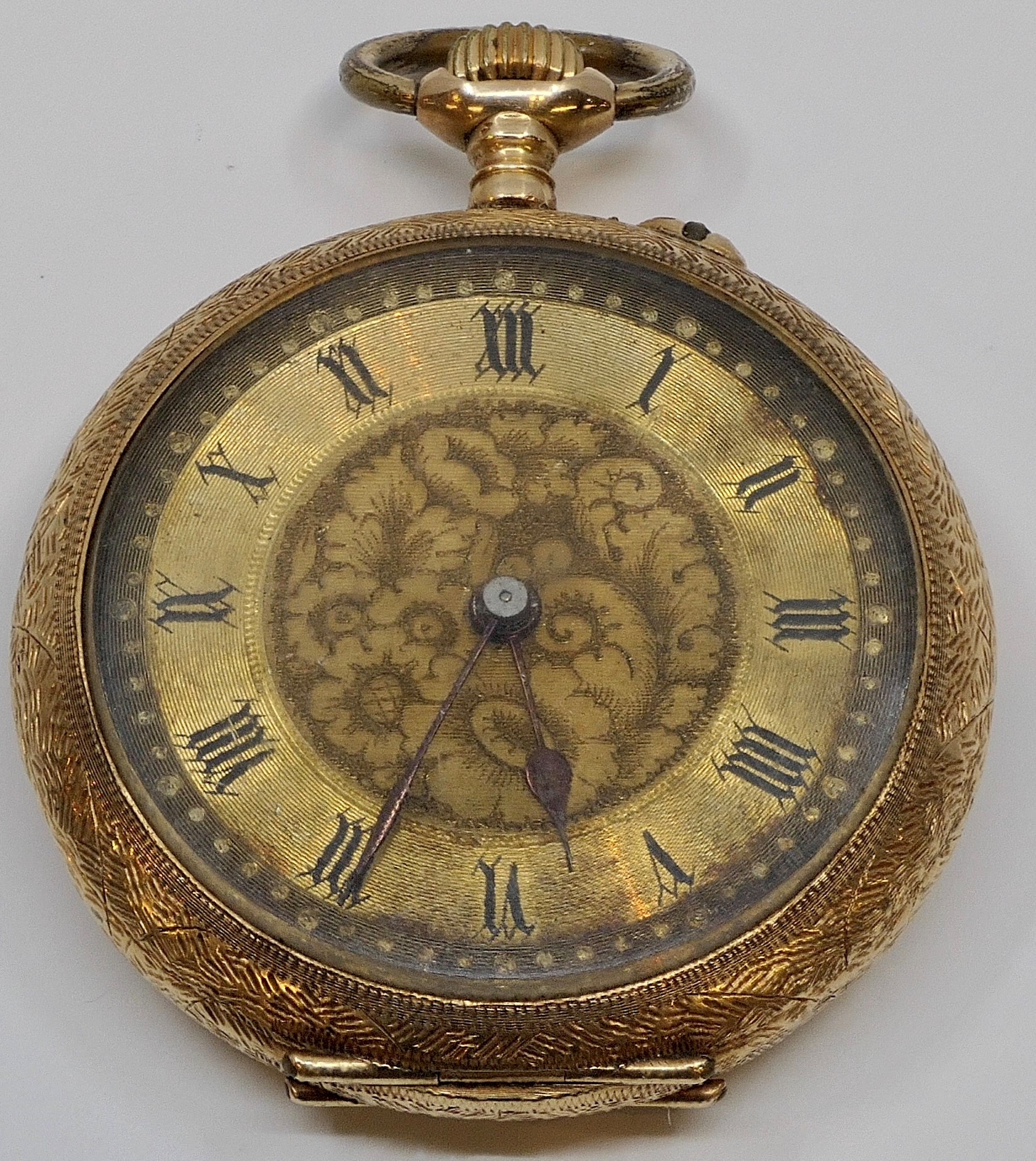 Yellow metal and gold-plated fob watch with foliate chasing, the dial with Roman chapter and