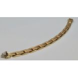 Yellow metal two-tone bracelet, stamped 585, length about 18cm, 26g, acid test positive for 14 carat