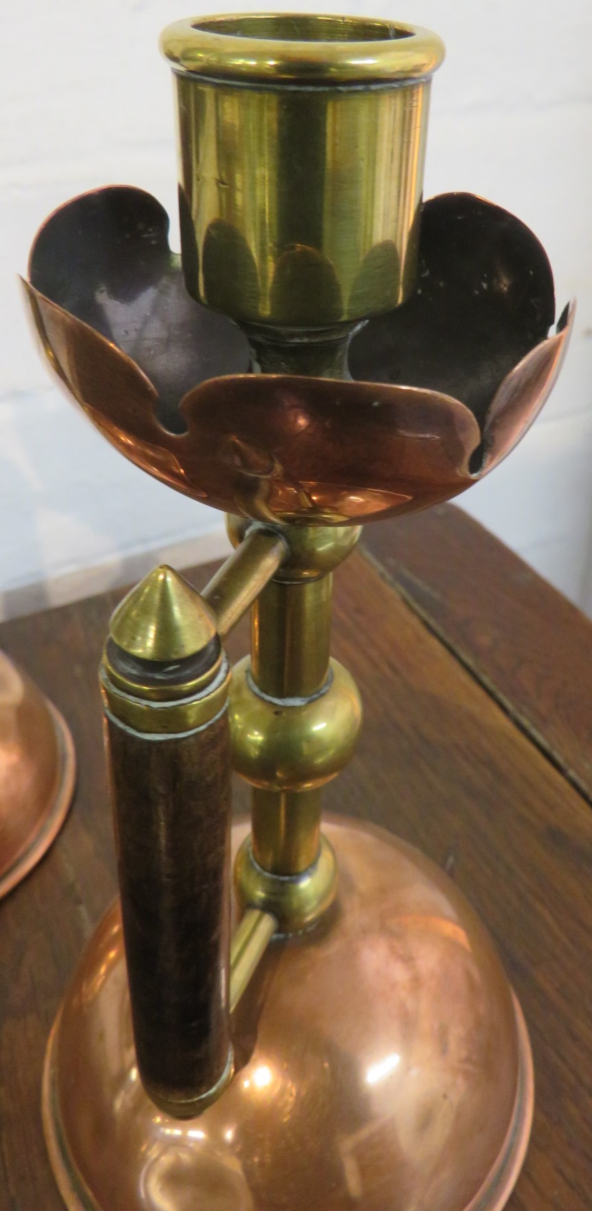 Matched pair of Christopher Dresser designed candlesticks, copper and brass with domed bases and - Image 4 of 4