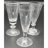 Three 19th century ale glasses with conical bowls and partially polished pontils - (1) plain stem,