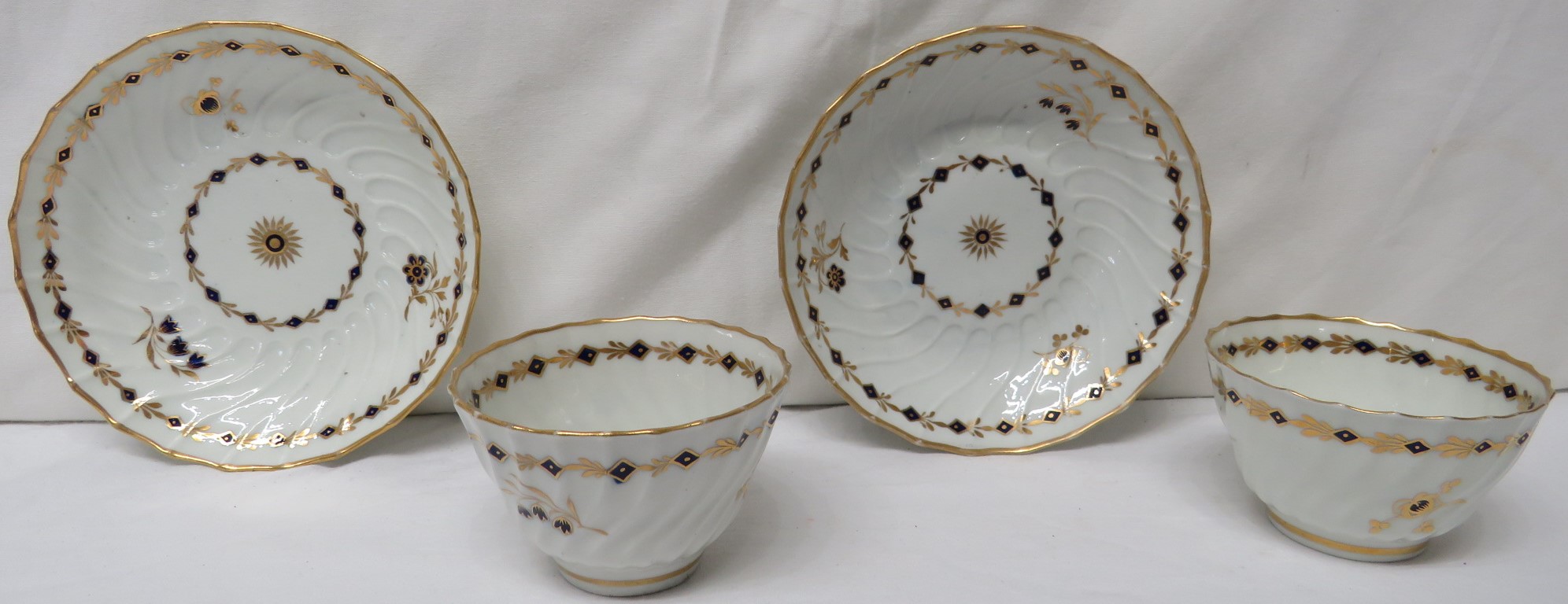 Two 19th century wrythen porcelain tea bowls and saucers, probably Worcester, each similarly - Image 2 of 4