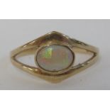 9 carat gold ring set with an opal (7mm x 5mm) in a wishbone setting, British hallmarks, gross