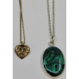 Silver and abalone oval pendant (24mm x 17mm), British hallmarks, London, 2003, on a white metal