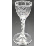 Jacobite influence wine glass with double series opaque twist stem, the bowl engraved with lily of