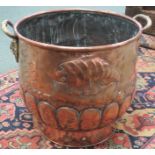 Newlyn style copper log bin with embossed decoration of longboats with risen and setting sun,