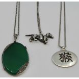 Three pendants on chains - Wachenheimer oval pendant set with green jade type stone and marcasites