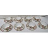 Set of eight very fine Dresden eggshell porcelain cups and saucers hand painted with flowers, the